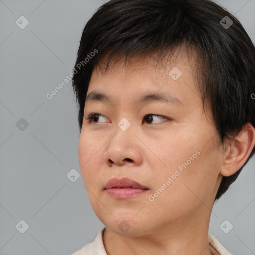 Neutral asian young-adult male with short  brown hair and brown eyes