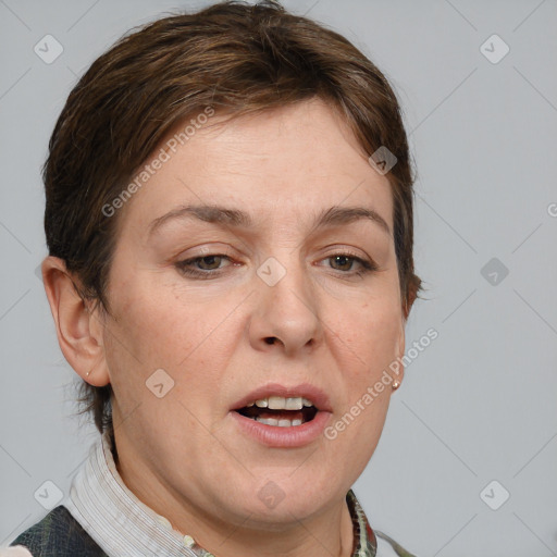 Joyful white adult female with medium  brown hair and grey eyes