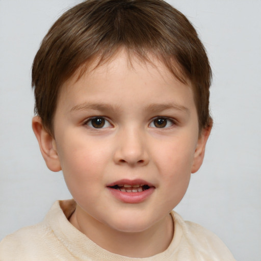 Joyful white child female with short  brown hair and brown eyes