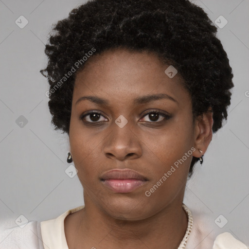 Neutral black young-adult female with short  brown hair and brown eyes