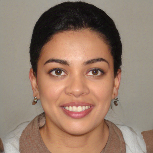 Joyful white young-adult female with short  black hair and brown eyes