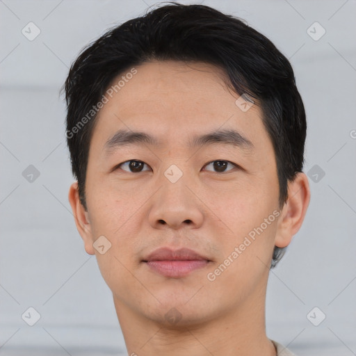 Neutral asian young-adult male with short  black hair and brown eyes