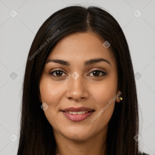 Joyful latino young-adult female with long  brown hair and brown eyes