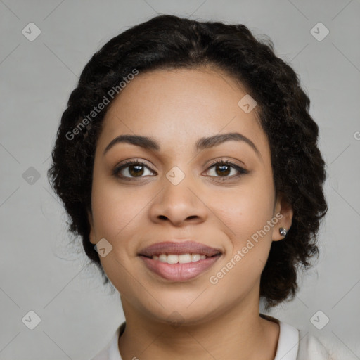 Joyful black young-adult female with medium  black hair and brown eyes