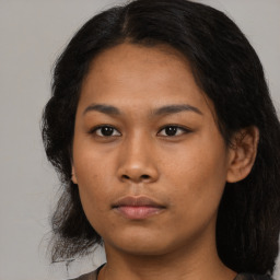 Neutral asian young-adult female with medium  black hair and brown eyes