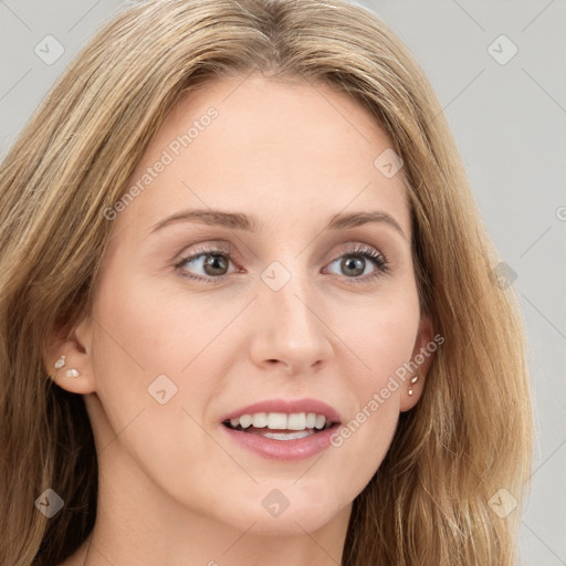 Joyful white young-adult female with long  brown hair and grey eyes