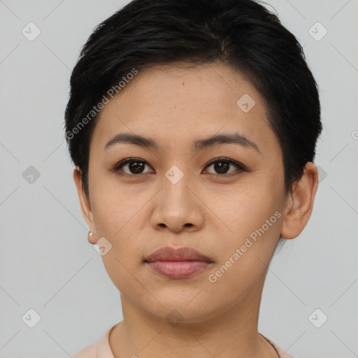 Joyful asian young-adult female with short  brown hair and brown eyes