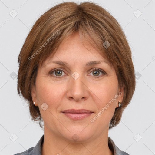 Joyful white adult female with medium  brown hair and grey eyes