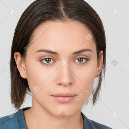 Neutral white young-adult female with medium  brown hair and brown eyes