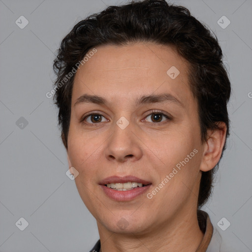 Joyful white adult female with short  brown hair and brown eyes