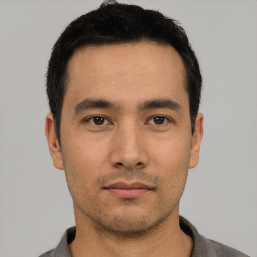 Neutral asian young-adult male with short  black hair and brown eyes