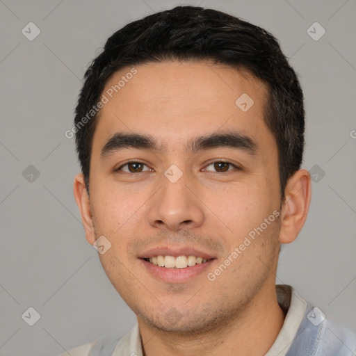 Joyful white young-adult male with short  black hair and brown eyes