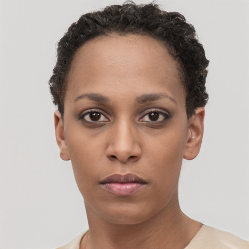 Neutral black young-adult female with short  brown hair and brown eyes