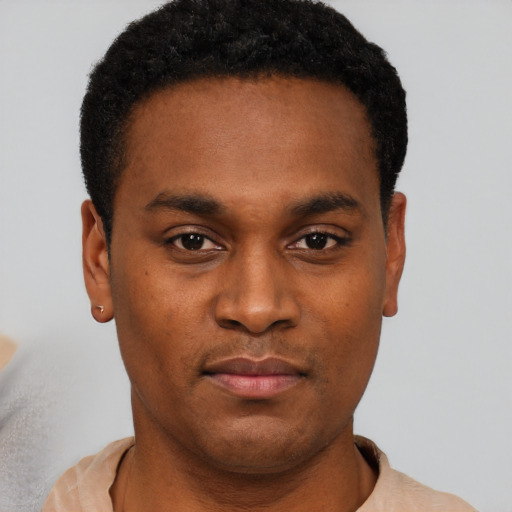 Neutral black young-adult male with short  black hair and brown eyes
