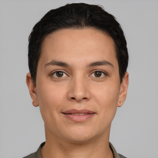 Joyful white young-adult female with short  black hair and brown eyes