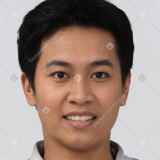 Joyful asian young-adult male with short  black hair and brown eyes