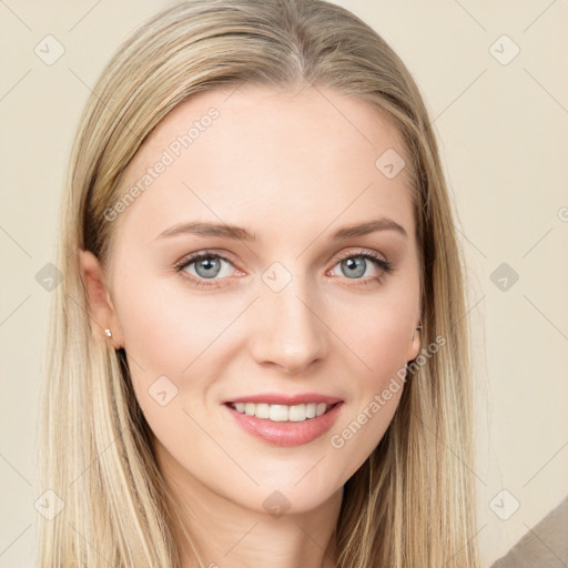 Joyful white young-adult female with long  brown hair and blue eyes