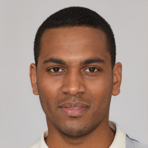 Neutral black young-adult male with short  black hair and brown eyes