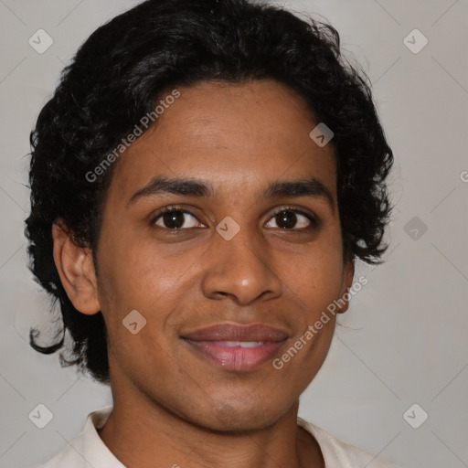 Joyful latino young-adult male with short  brown hair and brown eyes