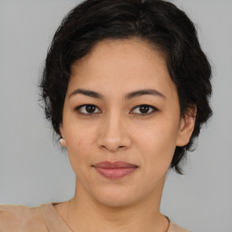 Joyful asian young-adult female with short  brown hair and brown eyes