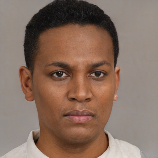 Neutral black young-adult male with short  brown hair and brown eyes