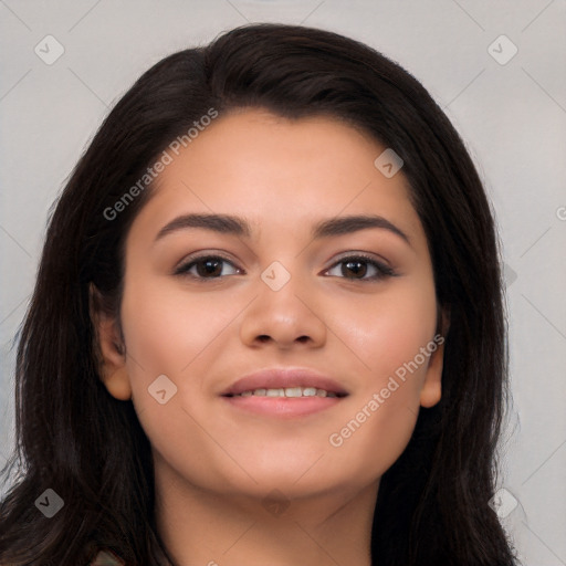 Joyful latino young-adult female with long  black hair and brown eyes