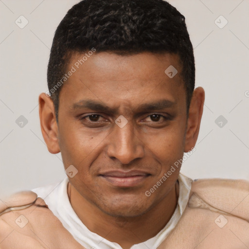 Joyful black young-adult male with short  brown hair and brown eyes