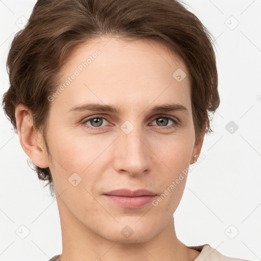 Joyful white young-adult female with short  brown hair and grey eyes