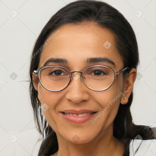 Joyful latino young-adult female with medium  brown hair and brown eyes