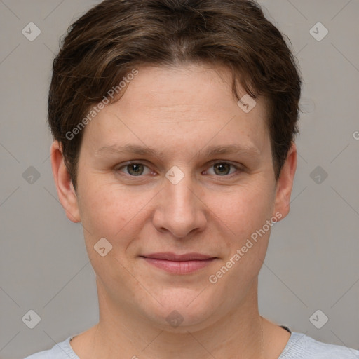 Joyful white young-adult female with short  brown hair and grey eyes