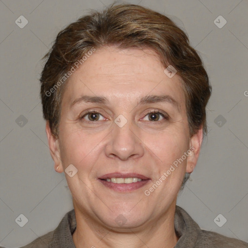 Joyful white adult female with short  brown hair and brown eyes