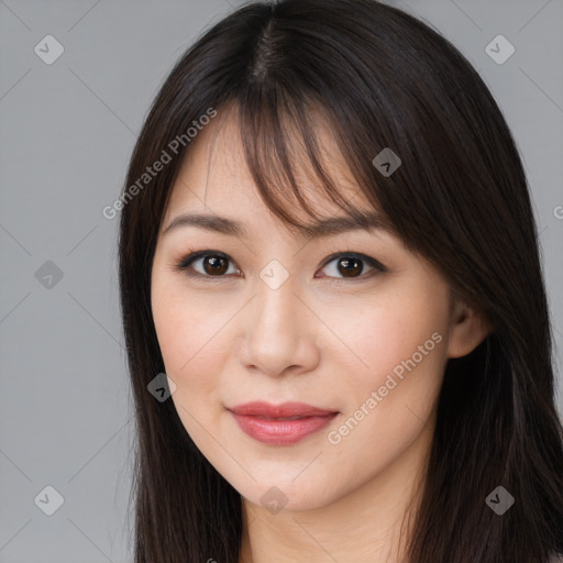 Joyful white young-adult female with long  brown hair and brown eyes