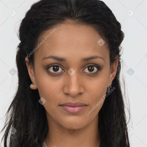 Joyful black young-adult female with long  brown hair and brown eyes