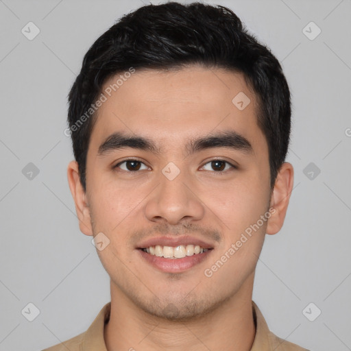 Joyful asian young-adult male with short  black hair and brown eyes