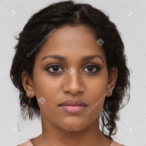 Joyful black young-adult female with long  brown hair and brown eyes