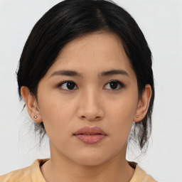 Neutral asian young-adult female with medium  black hair and brown eyes