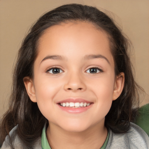 Joyful white child female with medium  brown hair and brown eyes