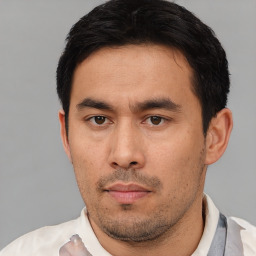 Neutral asian young-adult male with short  black hair and brown eyes