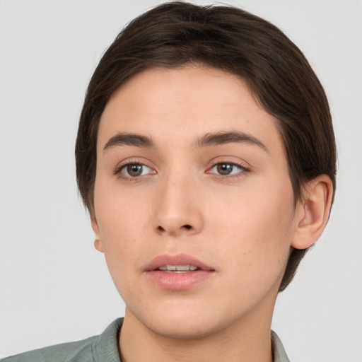 Neutral white young-adult female with short  brown hair and brown eyes