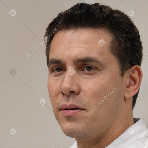 Neutral white adult male with short  brown hair and brown eyes