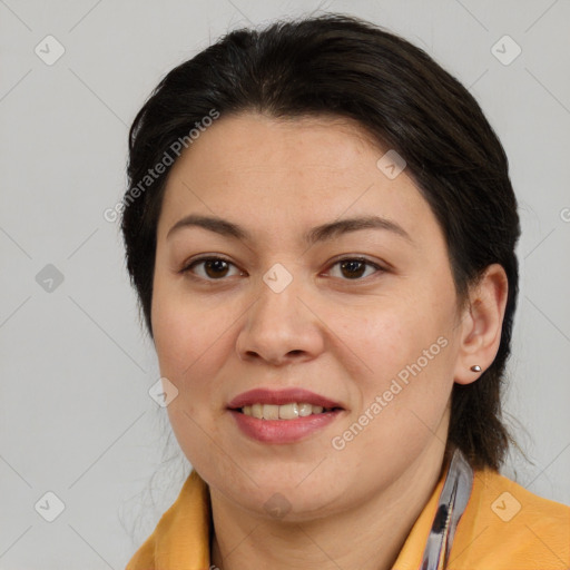 Joyful white adult female with medium  brown hair and brown eyes