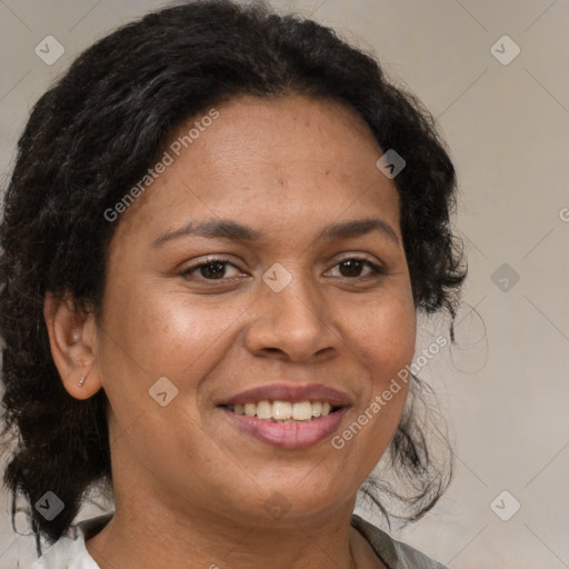 Joyful black adult female with medium  brown hair and brown eyes