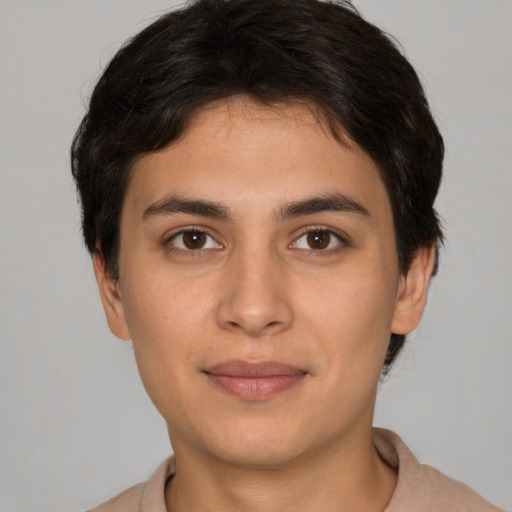 Joyful white young-adult female with short  brown hair and brown eyes