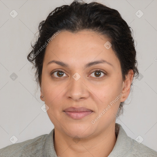 Joyful latino young-adult female with short  brown hair and brown eyes