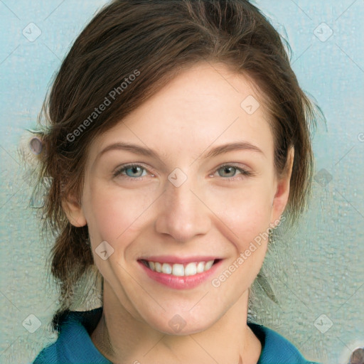 Joyful white young-adult female with medium  brown hair and blue eyes