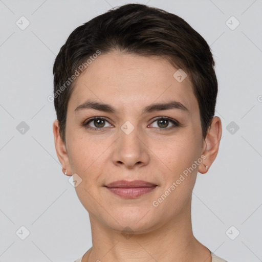 Joyful white young-adult female with short  brown hair and brown eyes