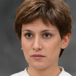 Neutral white young-adult female with short  brown hair and brown eyes