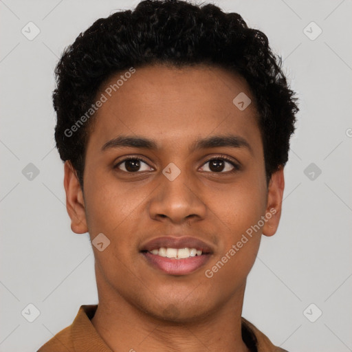 Joyful black young-adult male with short  black hair and brown eyes