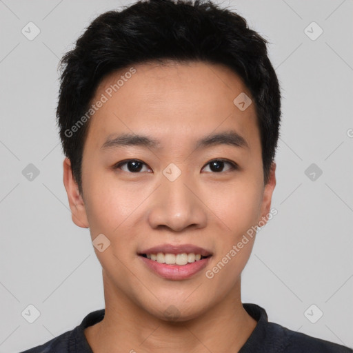 Joyful asian young-adult male with short  black hair and brown eyes