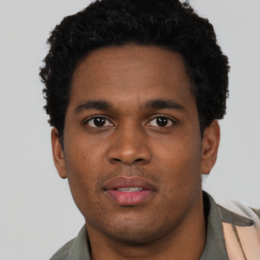 Neutral black young-adult male with short  brown hair and brown eyes